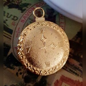 Gold Roman numeral clock pin